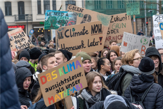 Protestors holding signs